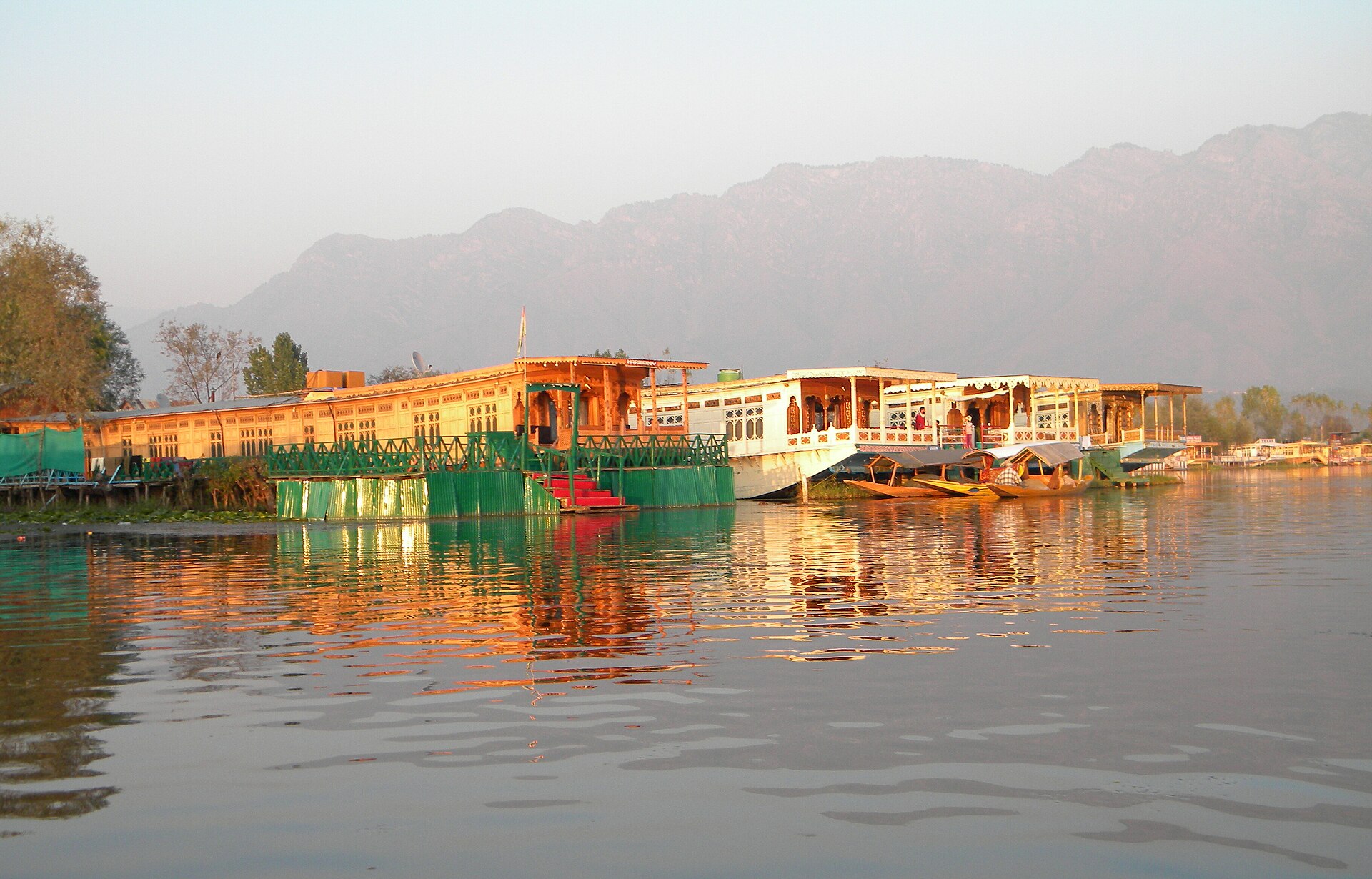 Carved cedar houseboats lining the shore of Dal Lake, Srinagar